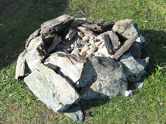 stones arranged into a circle to create a camp fire